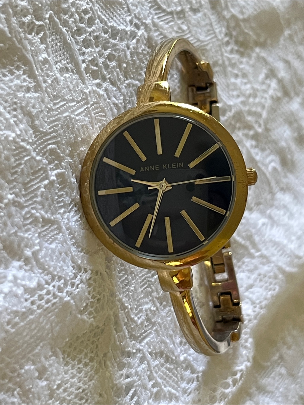 Anne Klein Gold Tone Bangle Watch With Black Dial And Gold Markers